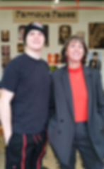 Adapted Trends - Rachel Thompson and Jake Thompson smiling with a gallery background