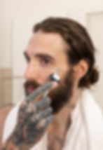 Man using dermaroller for skincare, prescribed by Blue Sky Medical Aesthetics in Reigate, Surrey