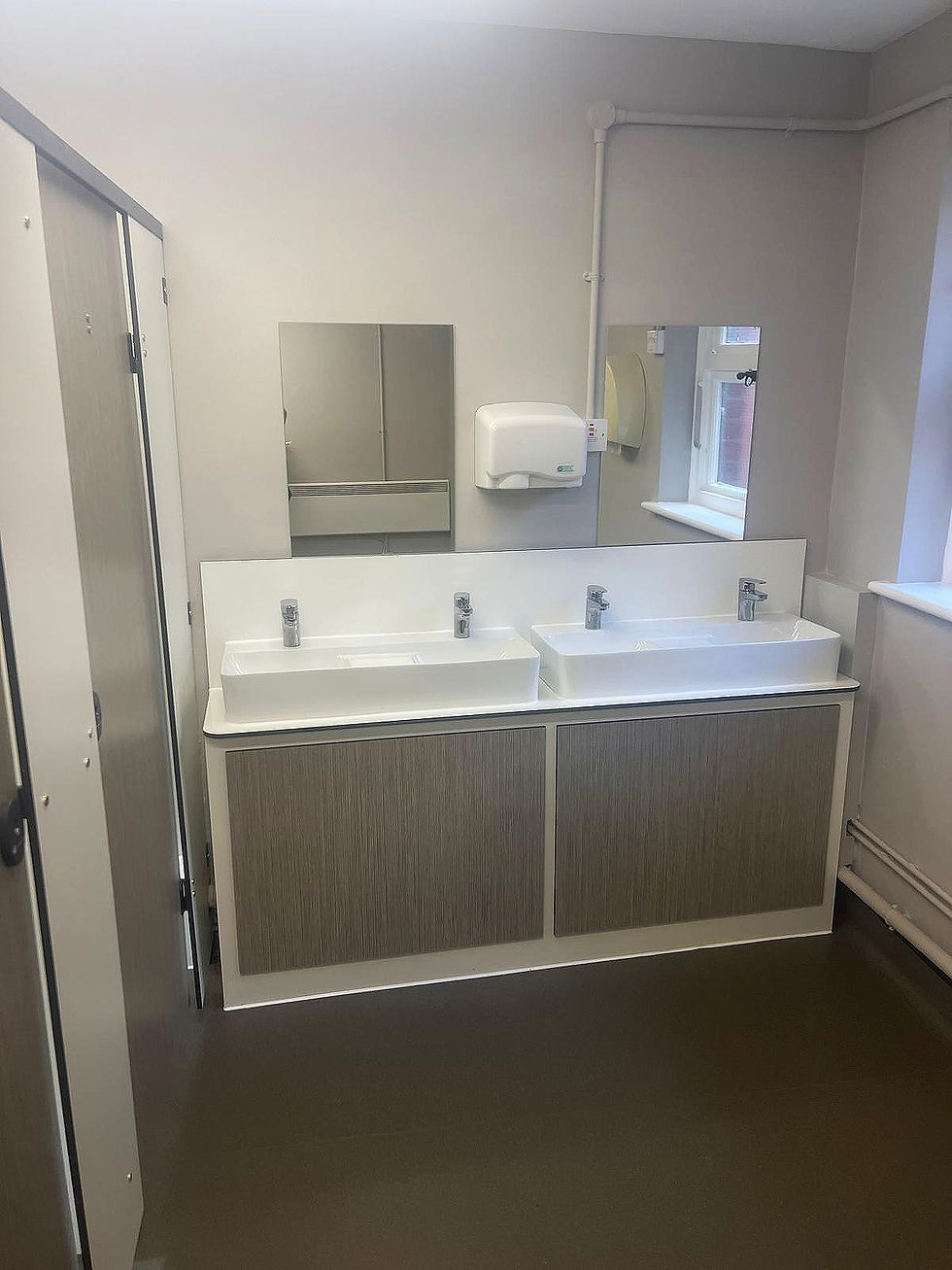 Washroom basins at NatWest Newport, installed by CJC Construction Group