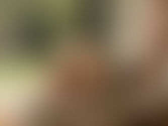 Woman craddling a dog's face