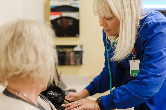 Nurse taking blood pressure at Lake Region Healthcare