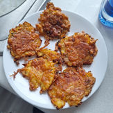 Smashed potatoes on a plate