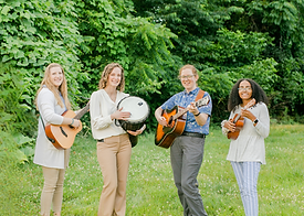 Music therapy team playing guitar, drum, and ukulele.