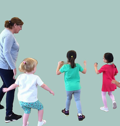 Music therapist leading a group of child