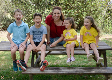 The photographer with her four kids around her