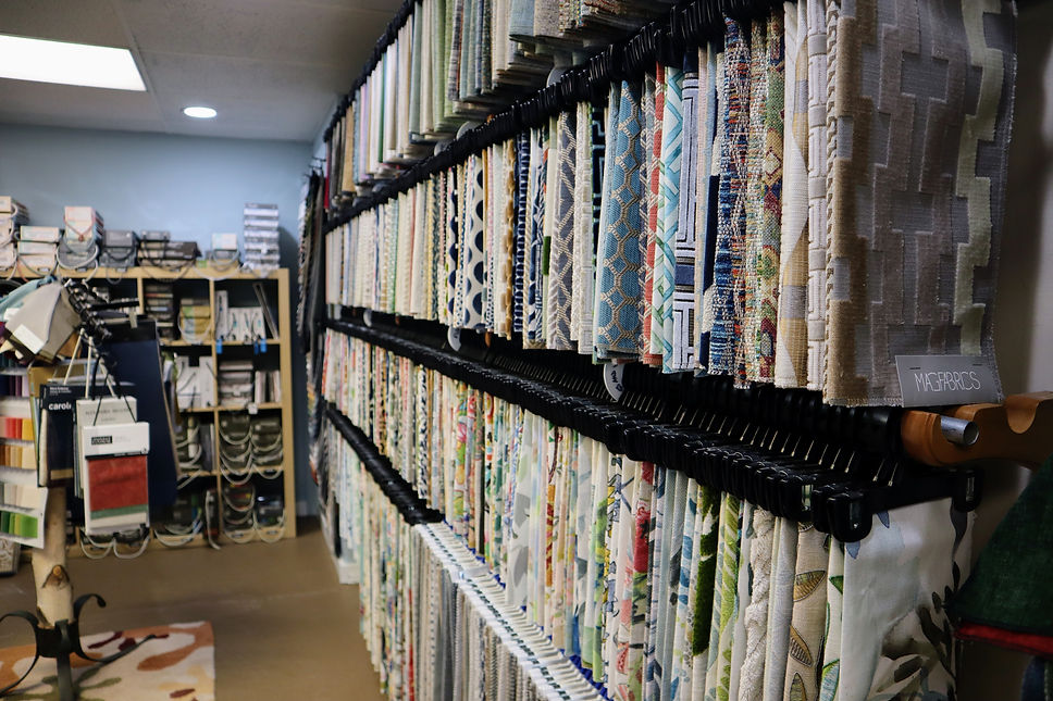 Fabric sample library at Joy of Home in South Burlington, Vermont — hundreds of upholstery and drapery samples available for custom orders.