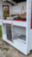 Summer Rain Farm Stand with bouquets, honey, soaps and cooler for fresh eggs