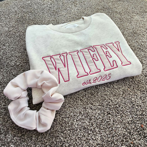 Digitized and embroidered "Wifey" sweatshirt and handmade scrunchie using remnants from the customer's bridal gown
