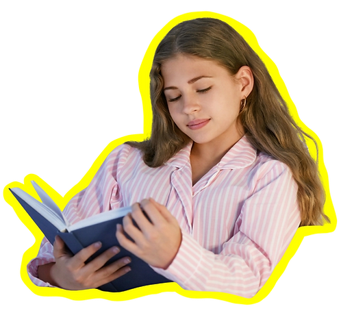 A teenager enjoying reading and not on a device
