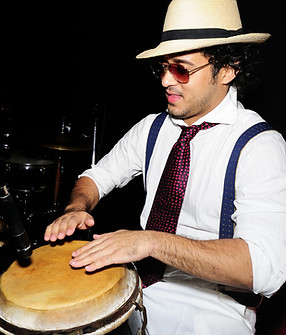 Man Playing Bongos