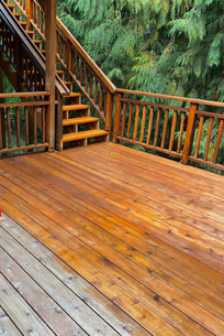 Professional deck staining services by Masters Construction, enhancing the beauty and longevity of outdoor spaces with expert craftsmanship.