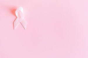 pink-ribbon-on-pink-surface-3900426.jpg
