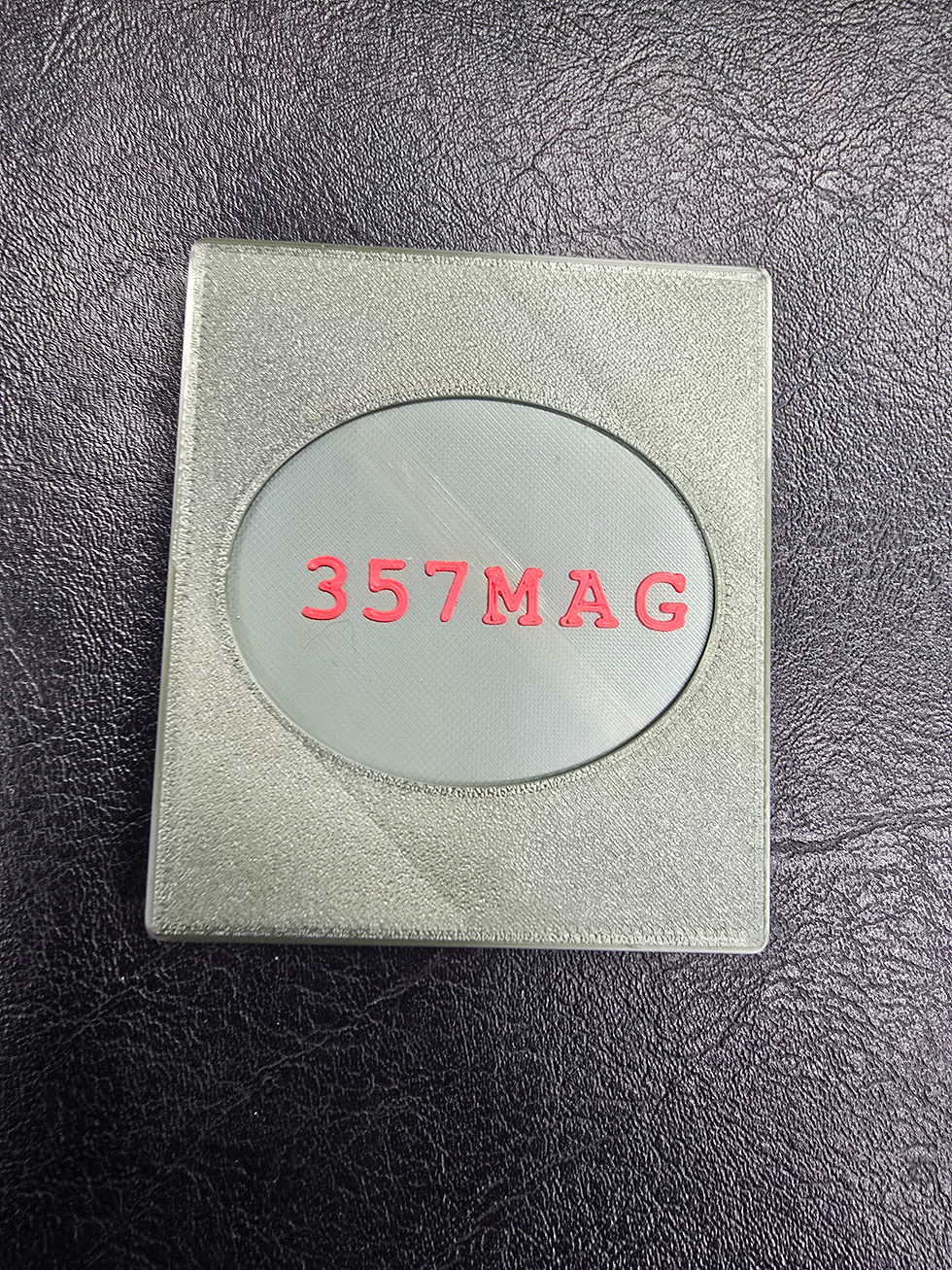 357 Magnum shell holder with cover.