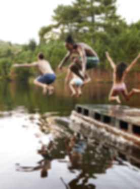 Kids Jumping into the Lake