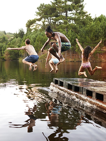 Kids Jumping into the Lake