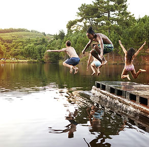 Kids Jumping into the Lake