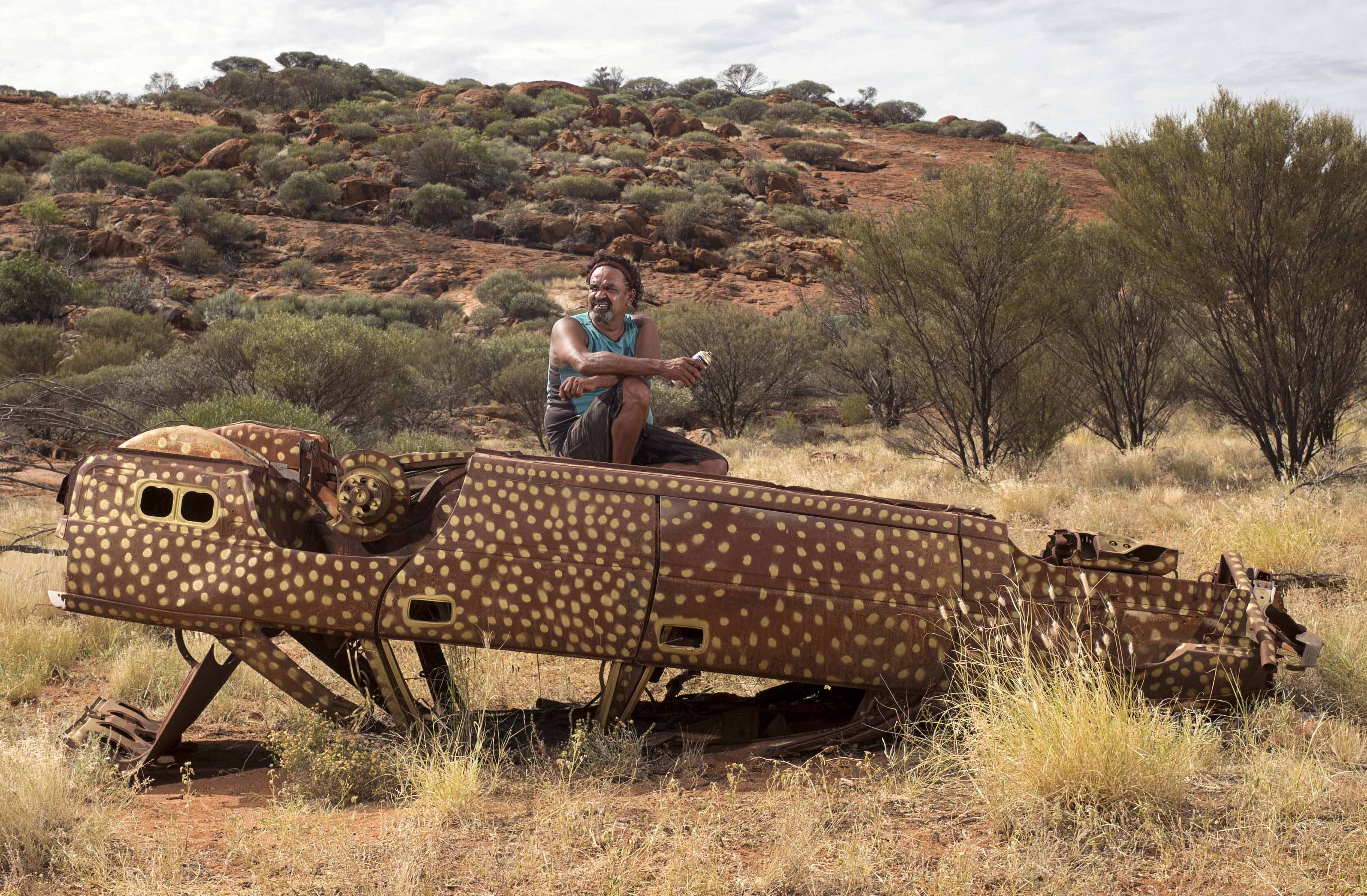 Robert Fielding with one of his sculptures on country