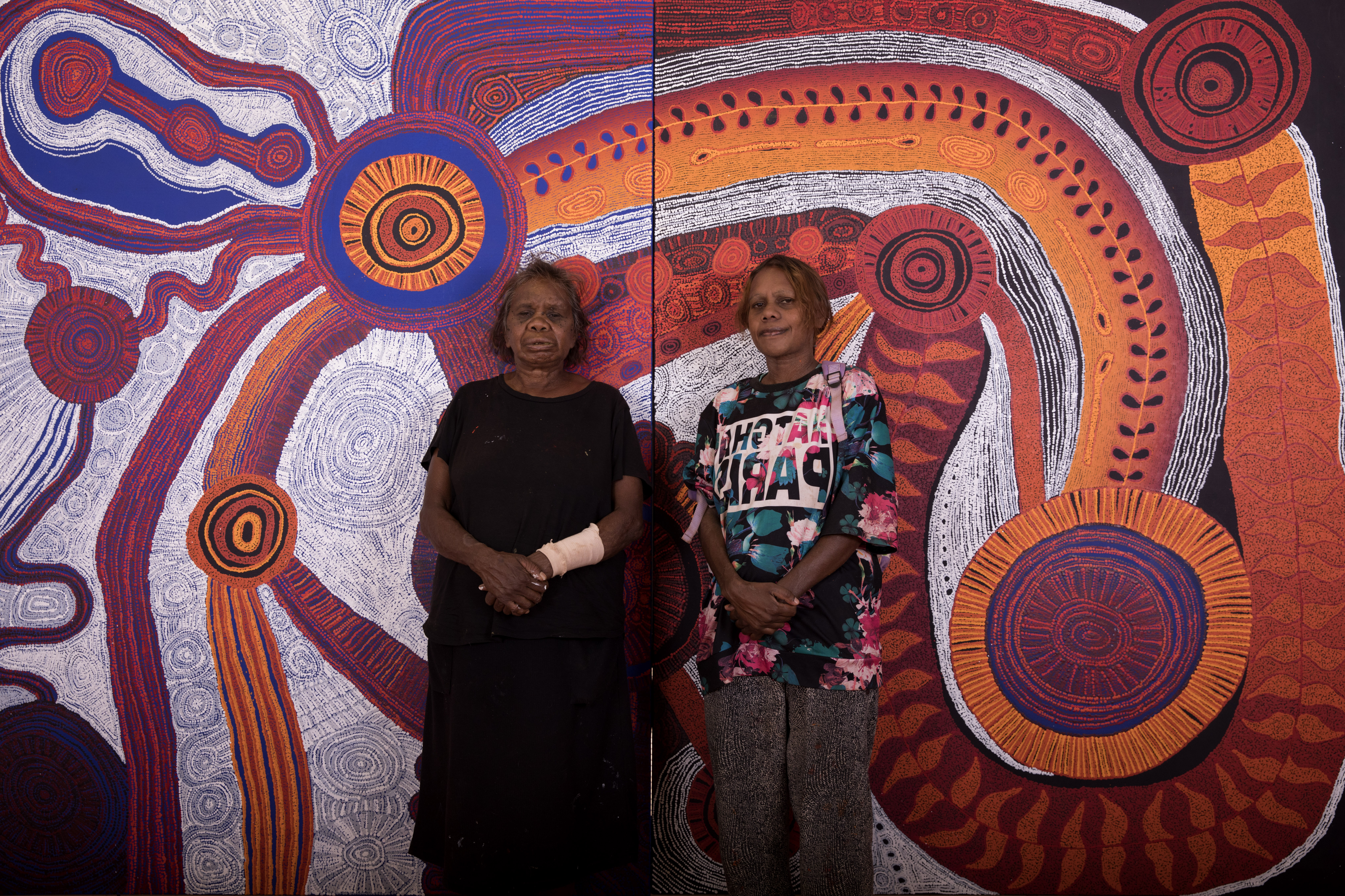 Betty Kuntiwa Pumani and Marina Pumani Brown in front of their collaborative canvas, photo: Meg Hans