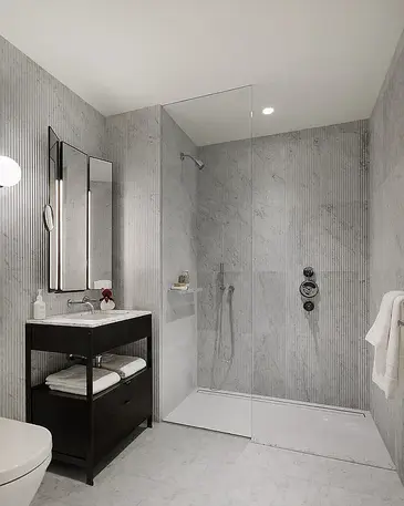 Modern bathroom with shower at 135 East 47th Street #8D rental apartment