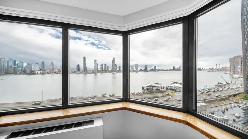Panoramic East River views from corner windows at 415 East 37th Street #11A