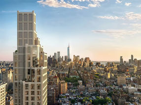 The Greenwich Spire rising above Greenwich Village with Lower Manhattan and Hudson River views