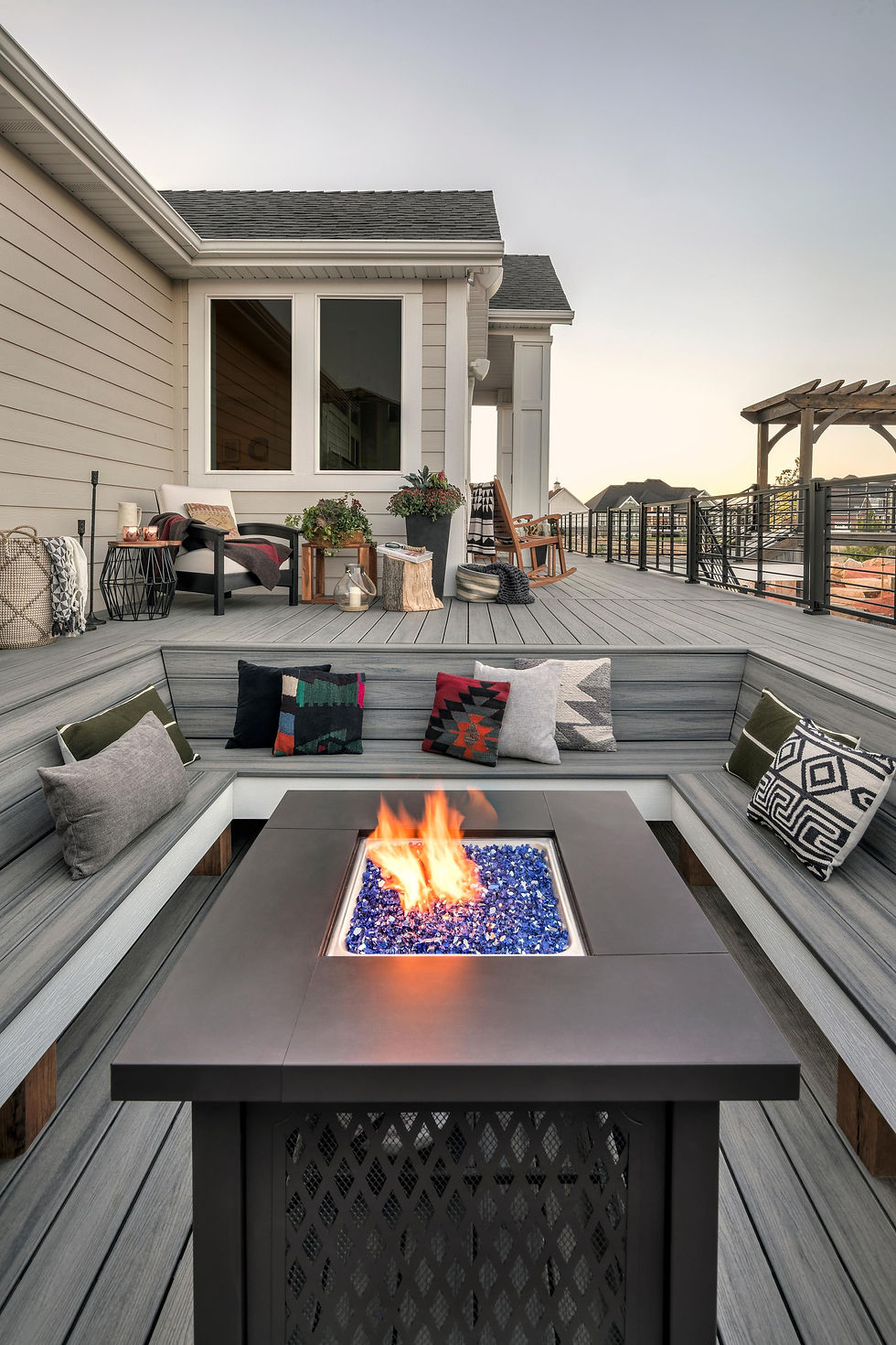 deck with built in seating and fire pit