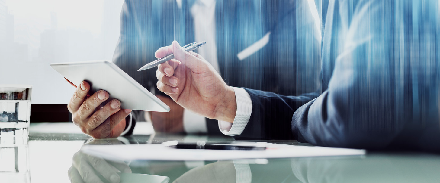 corporate-businessmen-working-tablet-office.jpg