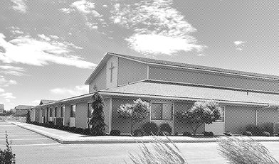 black and white photo of the church building outside