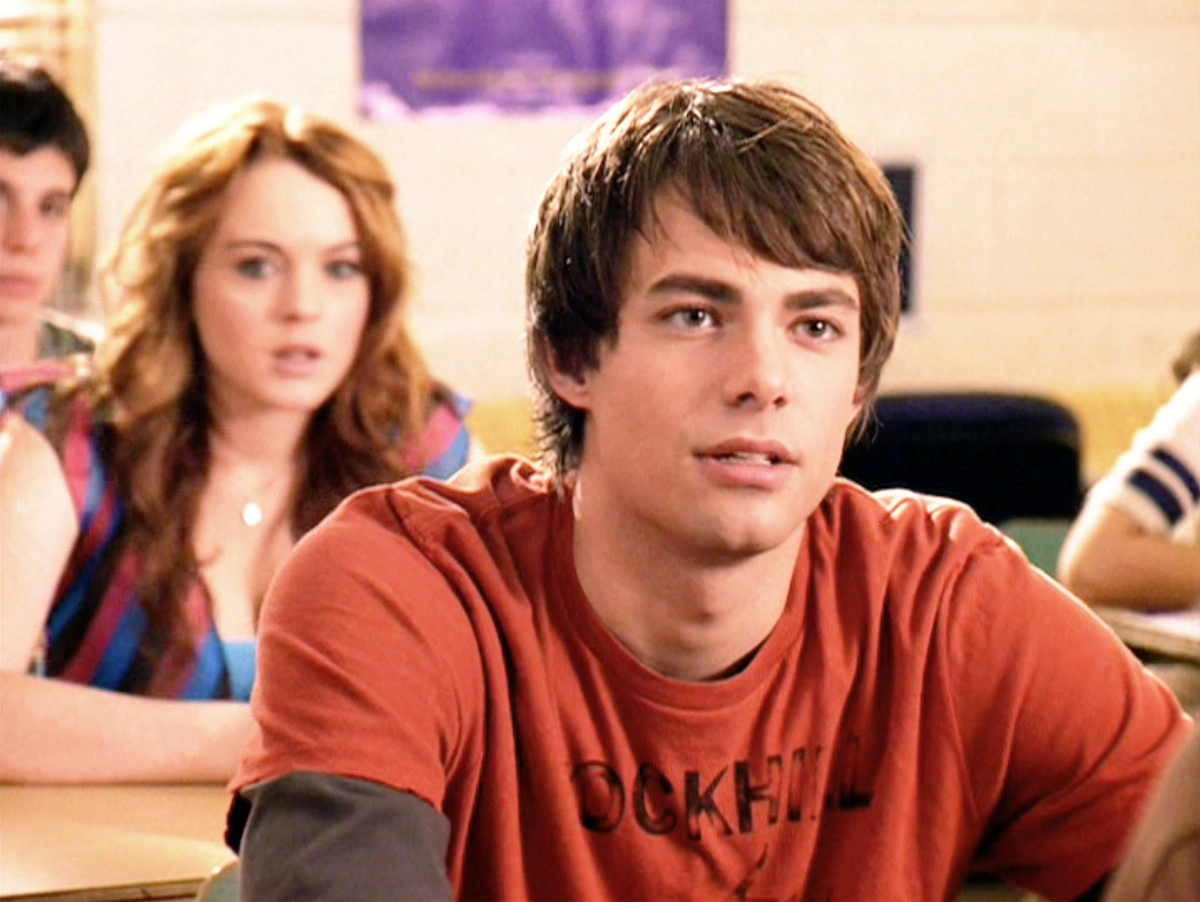 A still from Mean Girls, where Cady Heron looks in admiration at her crush Aaron Samuels