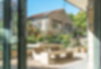Natural stone garage, garage doors, roof structure. guttering, roof tiles, windows