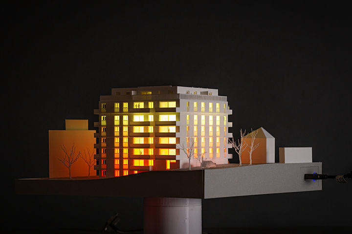 Professional architectural model of residential building in scale 1:200 with lights
