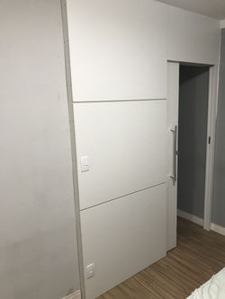 Carpenter Measuring Wood