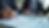 Eye-level view of a small business owner reviewing financial documents