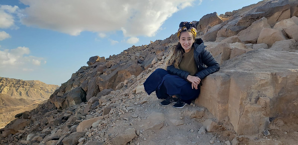 Oleh Sophie Knop hiking on a mountain