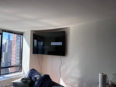 TV wall mounting service in New York City living room