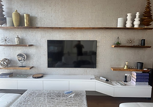 Modern living room featuring a professionally mounted flat-screen TV