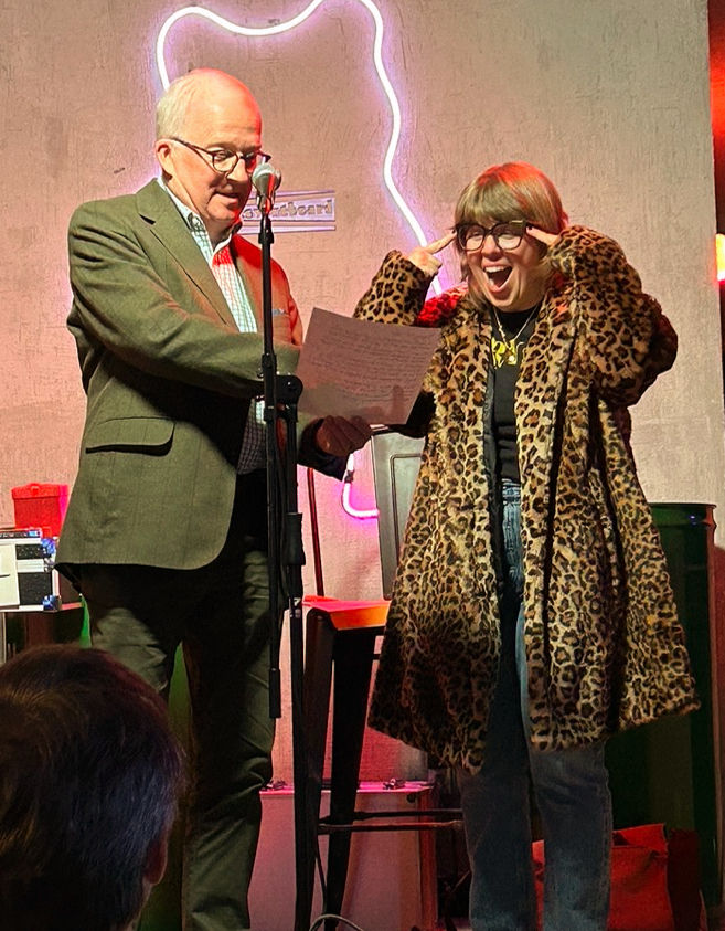 A woman experiences a moment of wonder and laughter