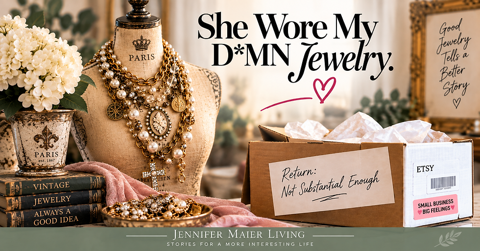 Vintage dress form layered with bold statement necklaces beside a return box, illustrating Jennifer Maier’s humorous personal essay “She Wore My Damn Jewelry.”