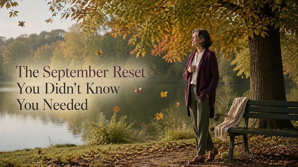 Mature woman in a plum cardigan pauses beside a lakeside bench as autumn leaves blow past, with the title “The September Reset You Didn’t Know You Needed.”