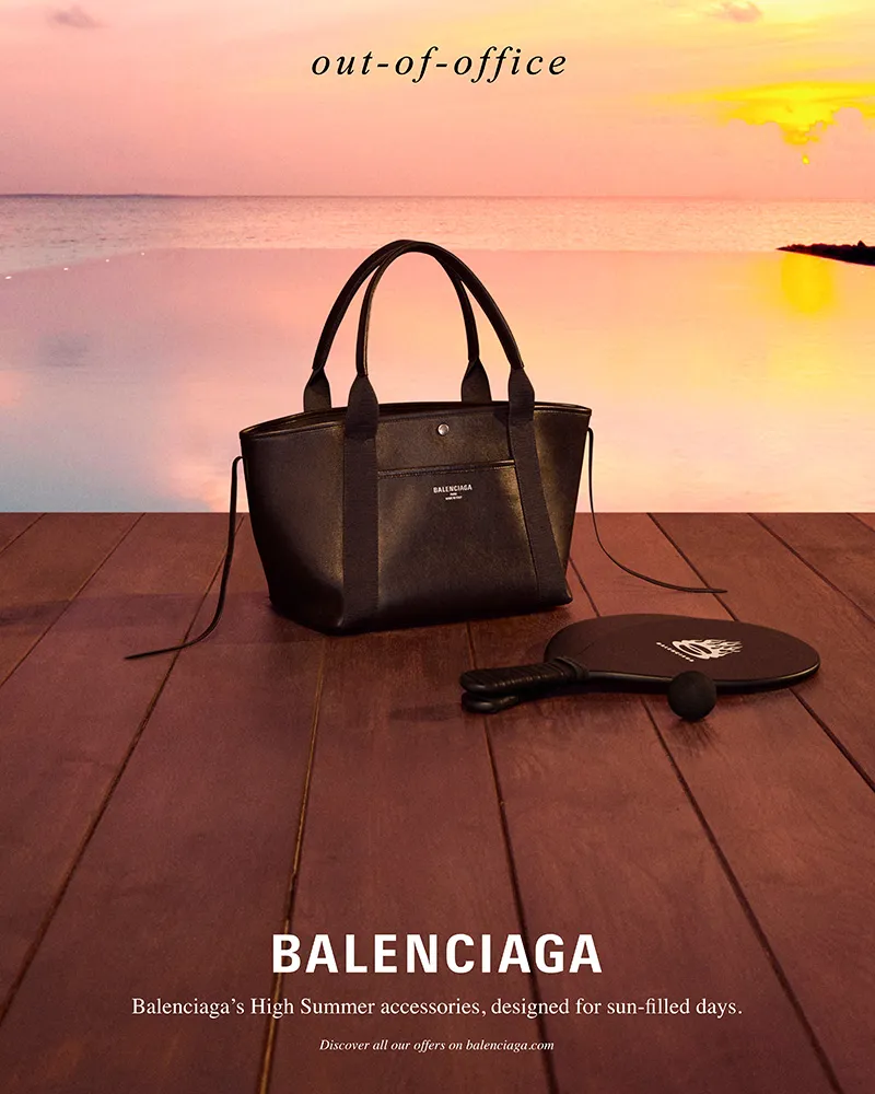 Balenciaga - High Summer 2025 campaign - a black bag by the poolside at sunset
