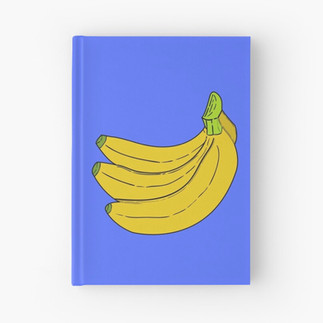 Blue hardcover journal with a bunch of three yellow bananas