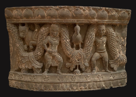 Hight; 55 cm (90 kg)
This panel piece shows a typical festoon pattern. Young men holding a wavy festoon (garland of flowers), which originated in Greece and Rome, and was very popular in Gandhara Art.
The cupid seems to carry the raised part of the festoon, and the lower part is decorated with grapes and a ribbon.
Animals (goat and peacock) looking through the feaston with a lotus-ribbon on the top and flowers on the lower level of the massive relief. These lush garlands were frequently featured in depictions of Jataka tales, in which the Buddha was previously incarnated as a bird.