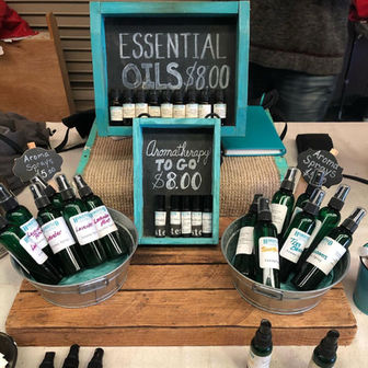 Essential oils and Something To Go at ToledoFarmers'Market display.