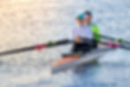 Person sculling on water