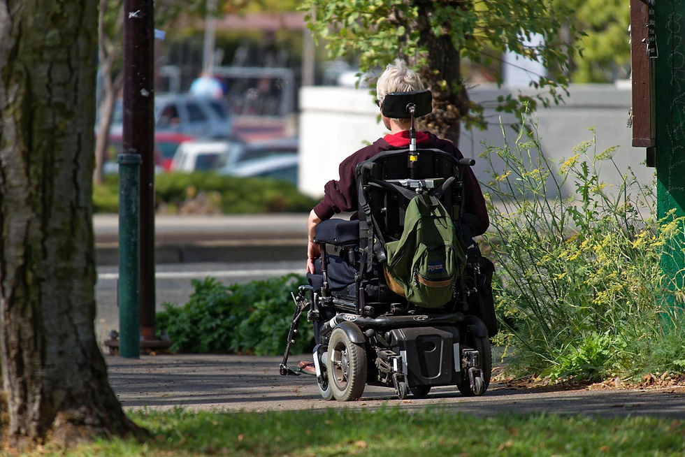 Polio survivor using a motorized wheelchair