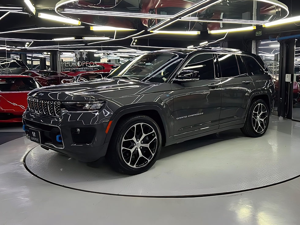 Eye-level view of a luxury armored SUV parked in a showroom
