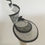 Thumbnail: Black and White -Ascot spiral hat in black and white sinamay on a white button