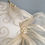 Thumbnail: Marji - Cream embroidered silk button headpiece with silk abaca bow and pearls