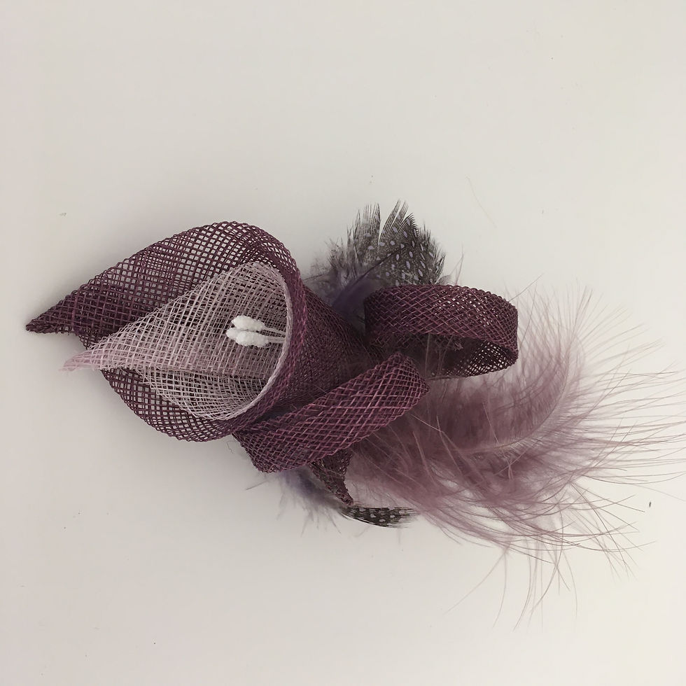 Ava -Purple and lilac sinamay lily fascinator with feather on a clip