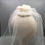 Thumbnail: Roberta - White lace and silk button headpiece with a shoulder length veil